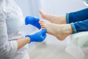 Close examination of a toenail, illustrating the ingrown toenail exams and treatment provided at CarePlus Foot and Ankle Specialists in Bellevue